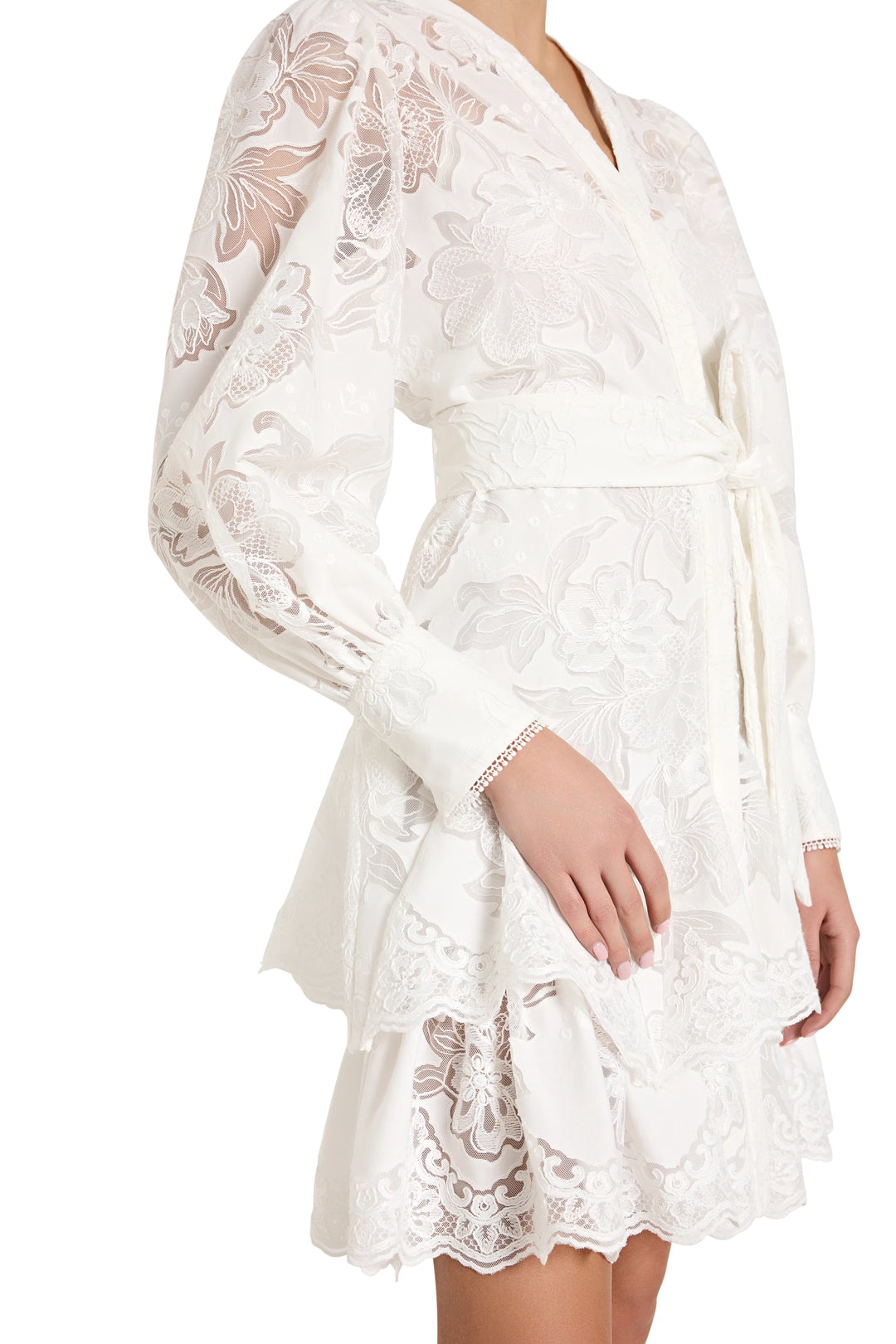 White lace dress with long sleeves on a white background