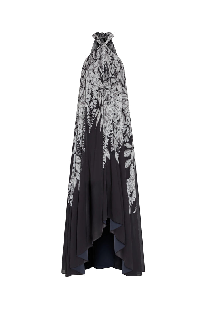 Black dress with white floral pattern on a white background