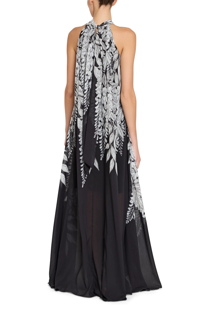Black and white floral halter neck gown on a white background