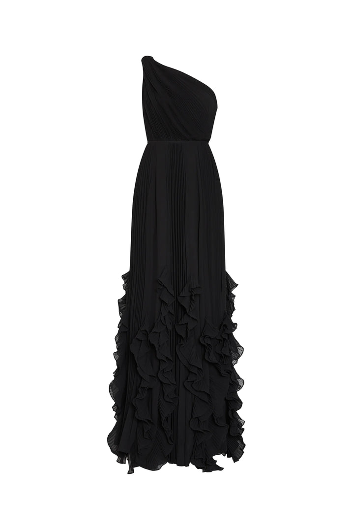 Black one-shoulder gown with ruffled skirt on a white background