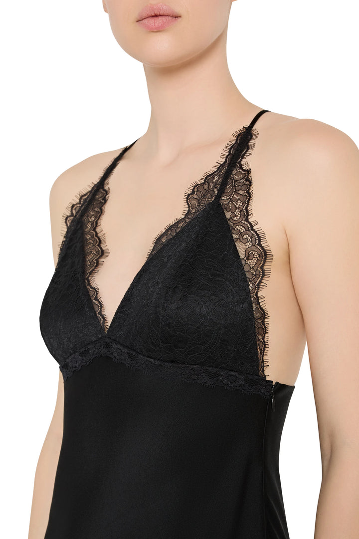 Black lace-trimmed nightgown on a white background
