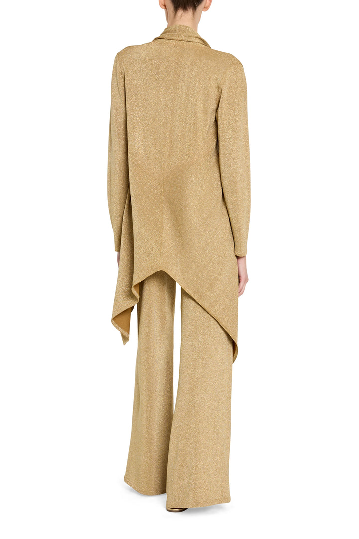 Beige long-sleeve top and wide-leg pants on a white background