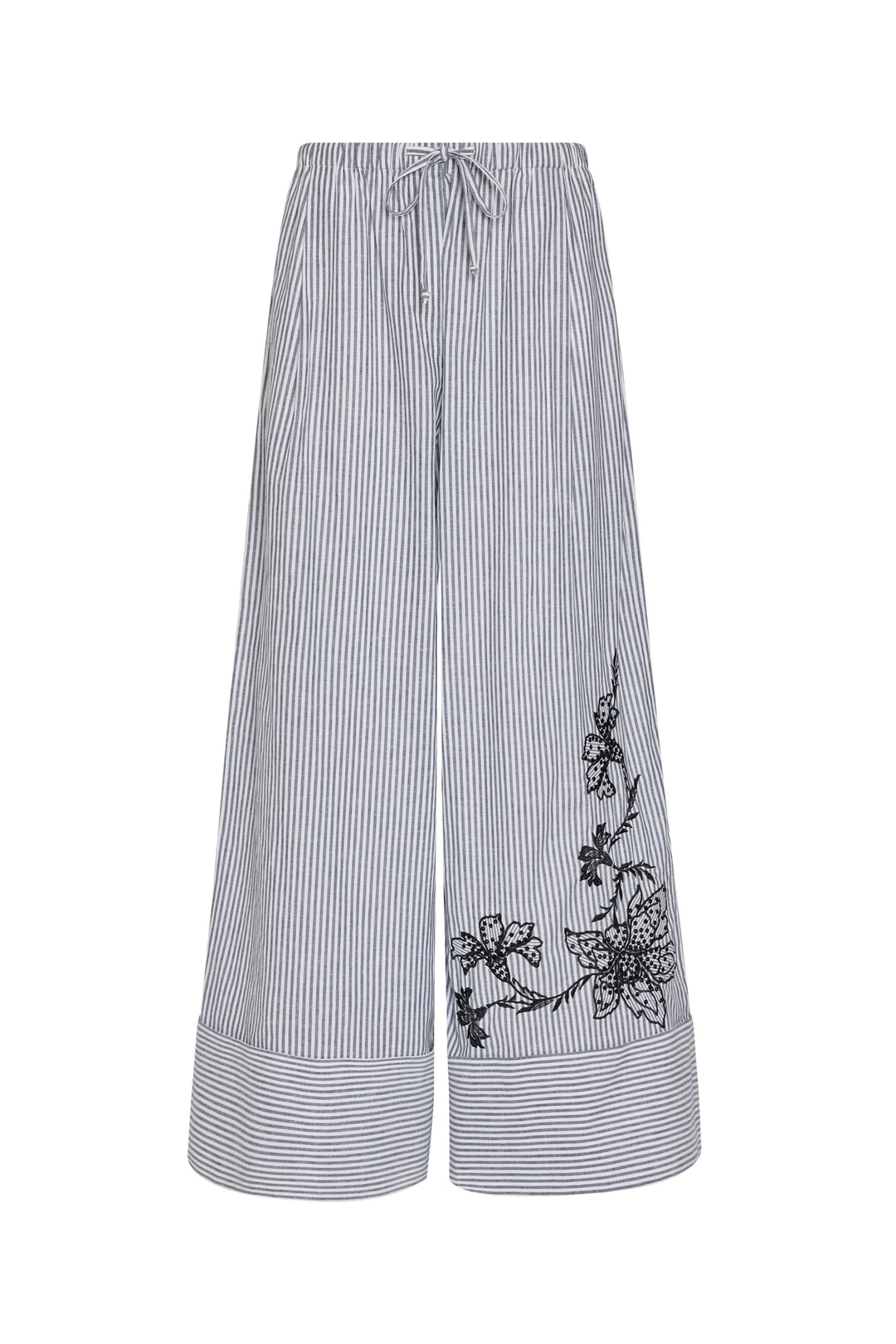 White pants with black stripes and floral embroidery on a white background