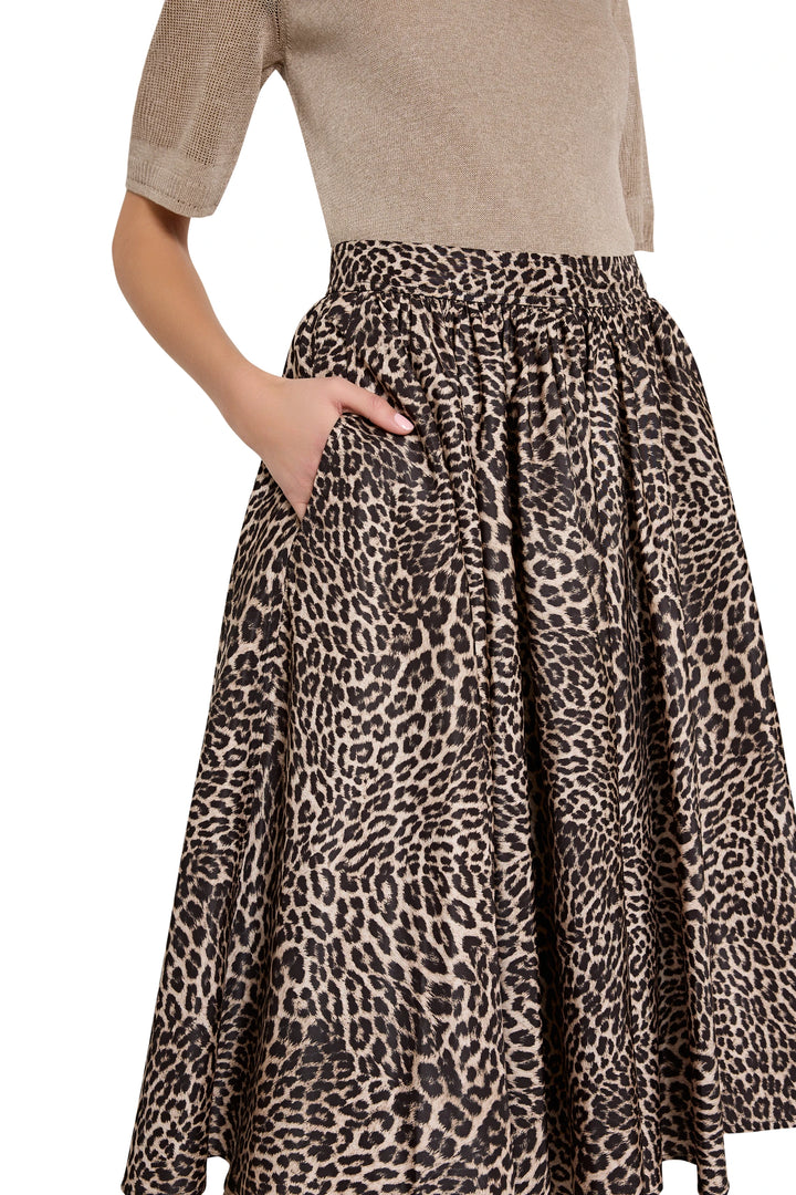 A-line midi skirt with side pockets and tailored waistband in Violet Leopard print, front view on model.