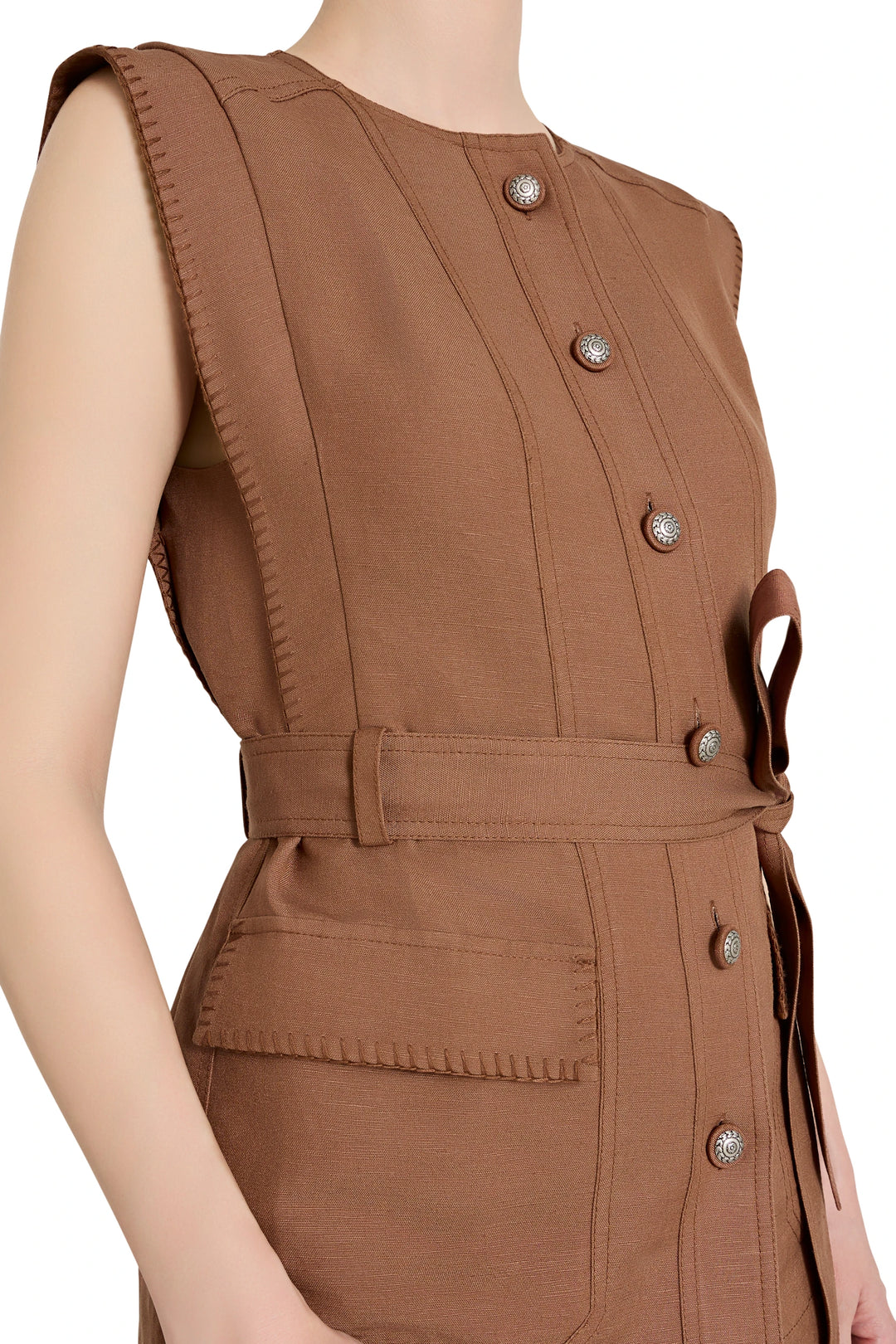 Sleeveless linen-blend vest with front buttons and patch pockets, belted waist. Front view on model.