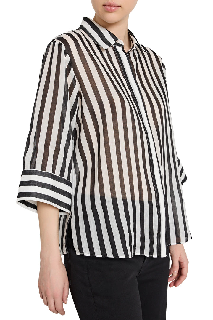 Person wearing a black and white striped shirt on a white background