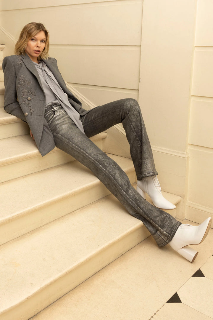 Single-breasted blazer with notched lapel, tailored fit, hand-embroidered flannel; front view on model.